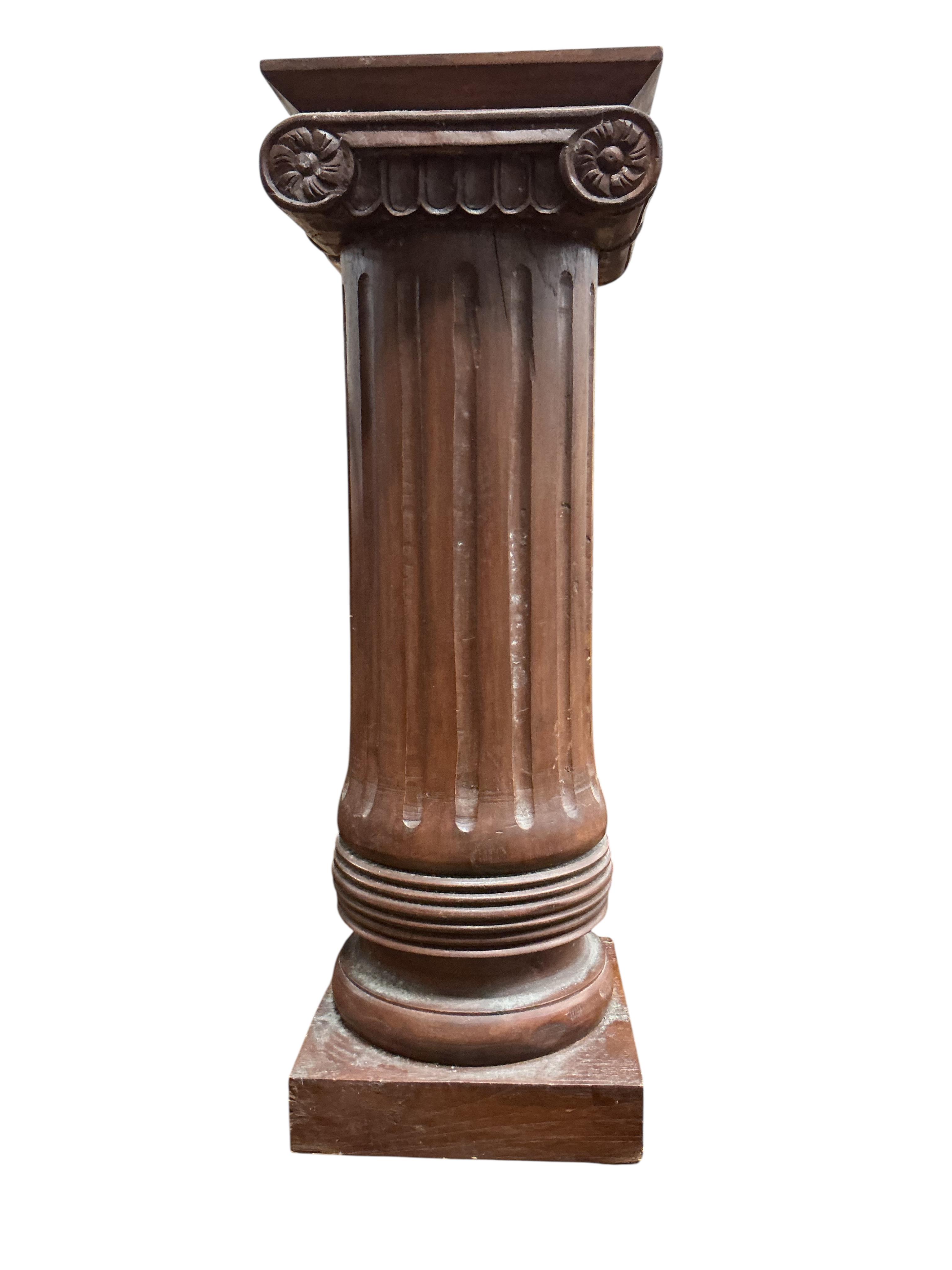 A reproduction mahogany ionic column pedestal, height 62cm